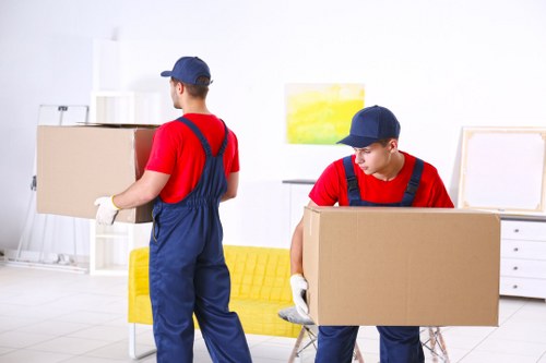 Professional same day removals service in Notting Hill with moving van and boxes