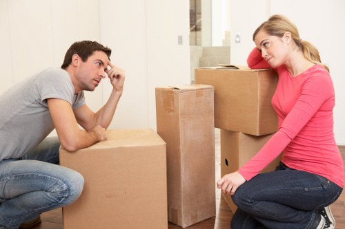 Packed moving boxes and furniture ready for a Notting Hill home move