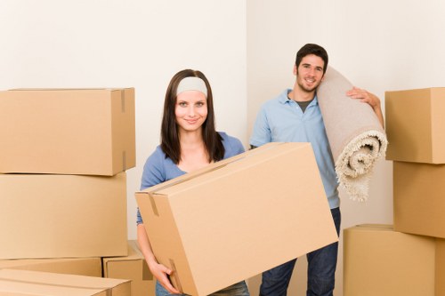 Movers handling furniture during a Nottinghill home relocation