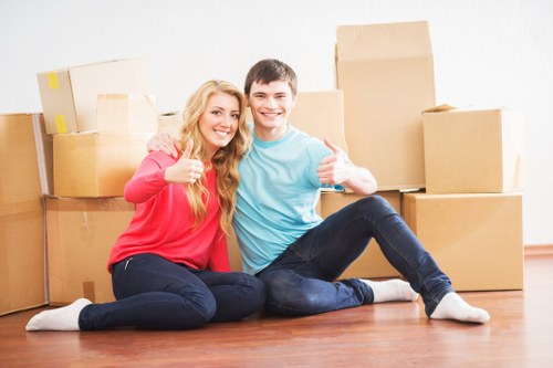 Staff completing a pre-move risk assessment in a property