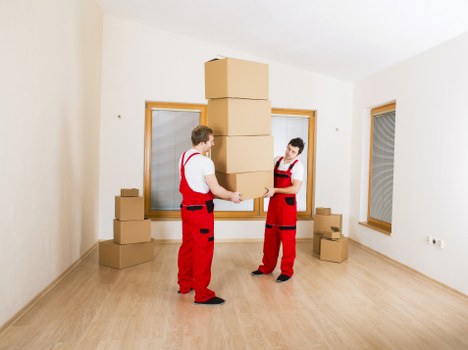 Prepared moving boxes and furniture protection for a residential move in Notting Hill