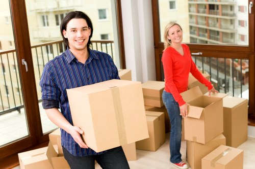 Furniture removals planning with boxes and tools in a Notting Hill property